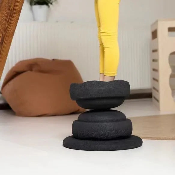 Plastic wood surf balance board for children aged 4-6 with mixed colour wood grain and black design.
