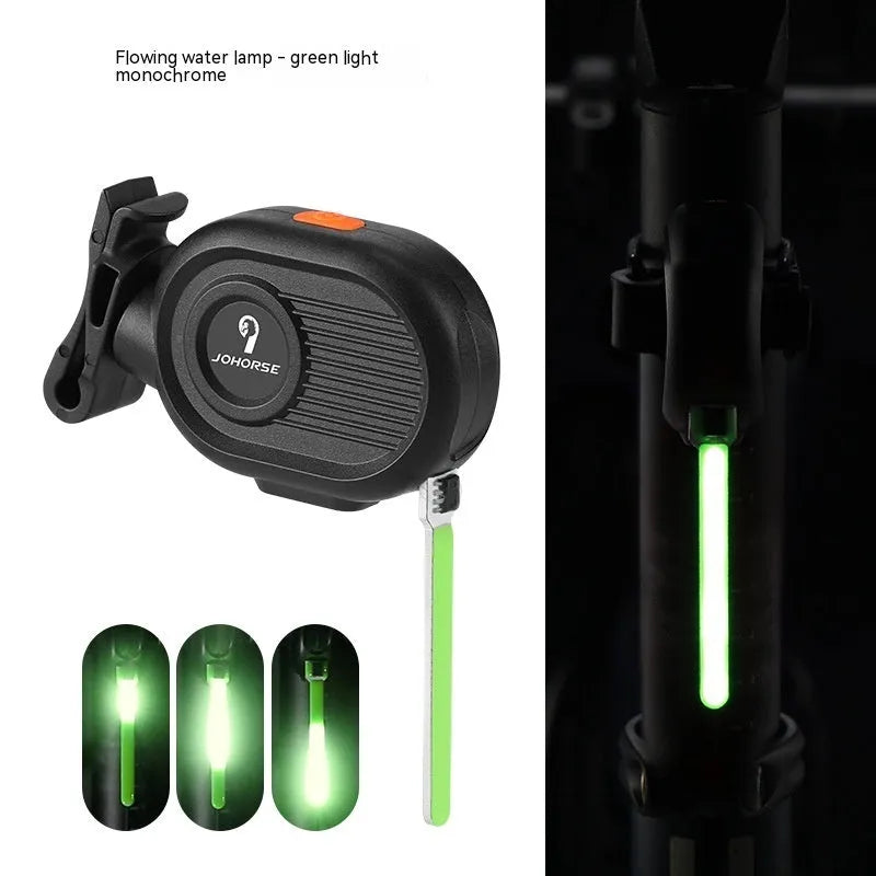 Bicycle running water taillight showing waterfall light effect in blue, mounted on a bike seat post.