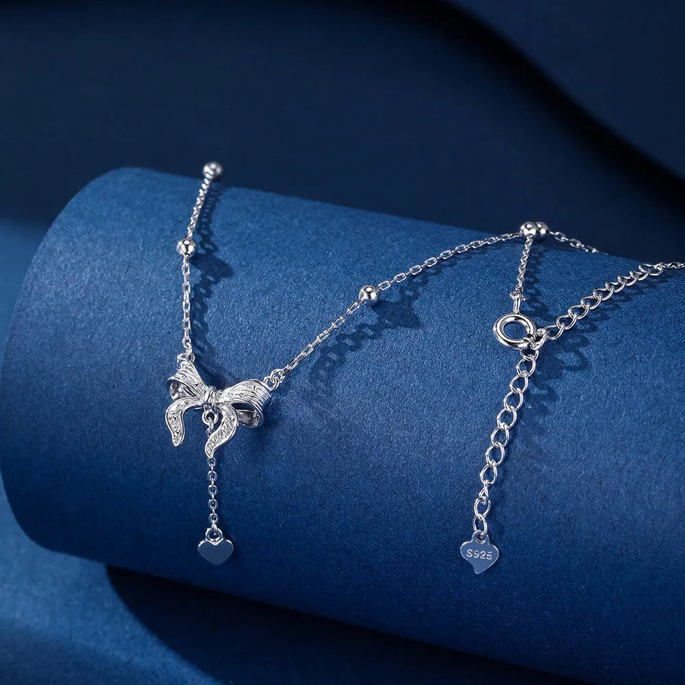 S925 silver butterfly heart pendant on an adjustable O-ring clavicle chain.