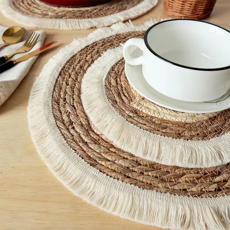 Round straw placemat with tassel edges in papyrus material showing corn rope colour option