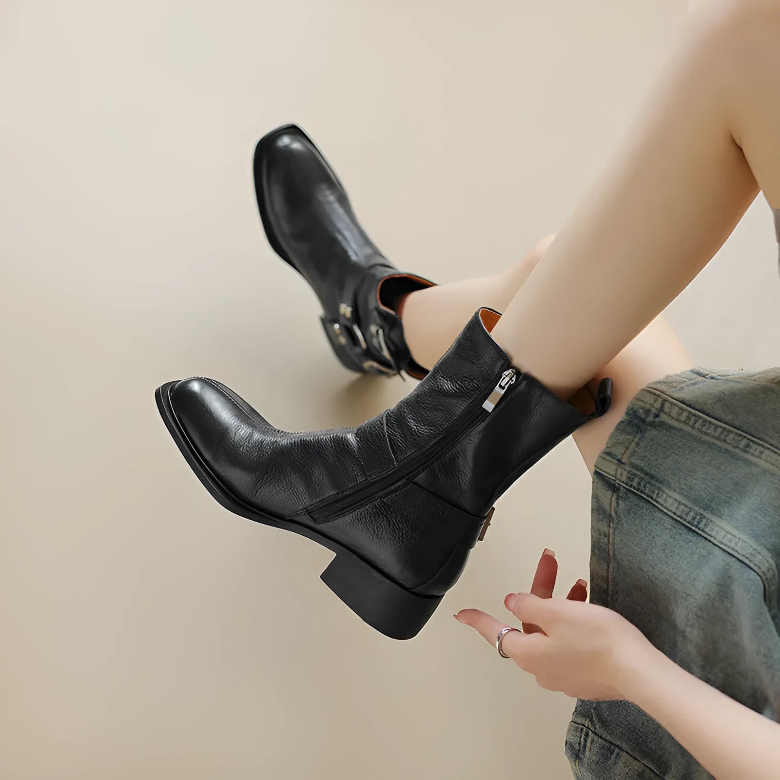 Women's genuine leather chunky heel short boots in black, side view