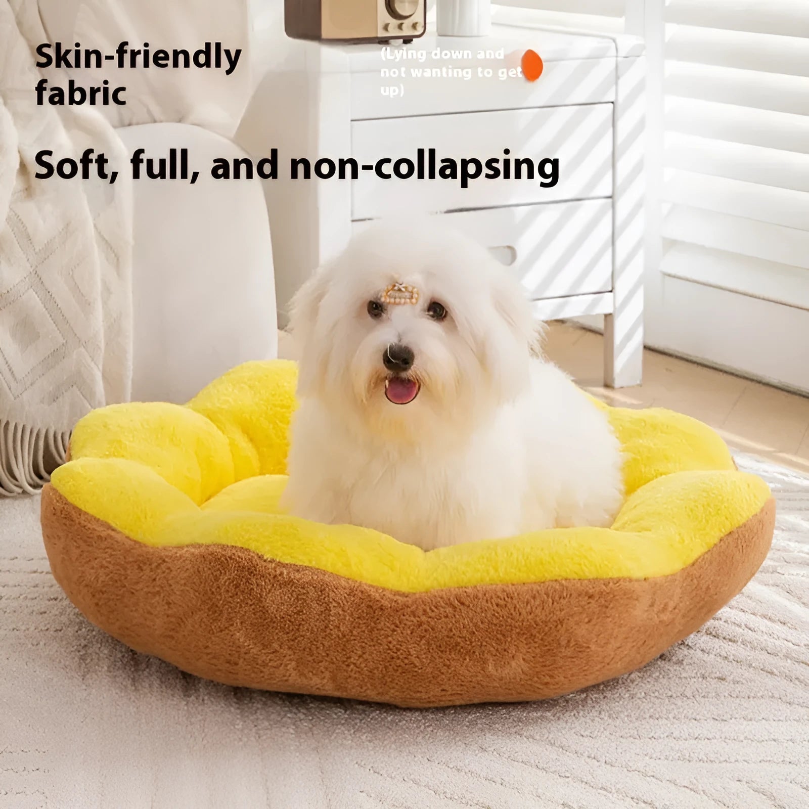 A round, thick plush cat bed with a removable cover shown in a two-tone colour, placed next to a cat toy.