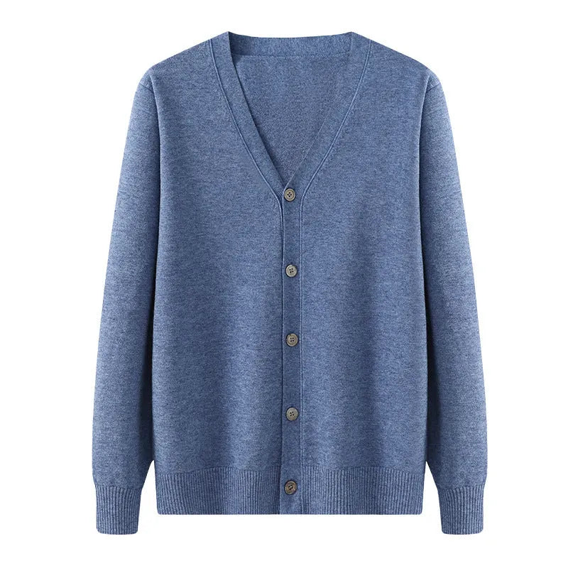 Man wearing loose fit V-neck Andy velvet cardigan coat in dark blue colour
