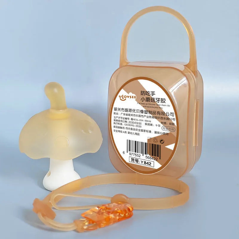 Small mushroom-shaped food grade silicone gel charm in pink or nano colour with chain attachment