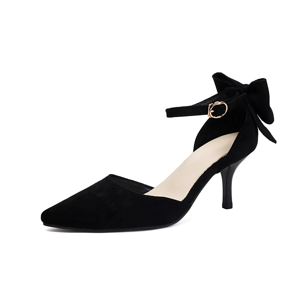 Pointed-toe stiletto high heels with a bowknot on suede upper.