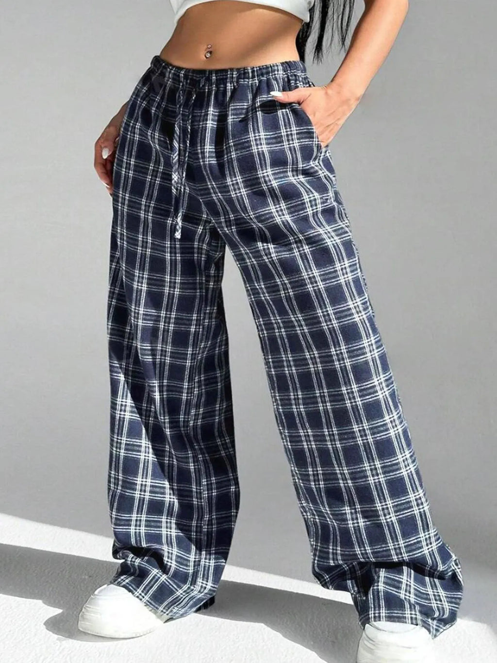 Blue plaid pocket on women's loose-fit casual trousers with a drawstring waistband.