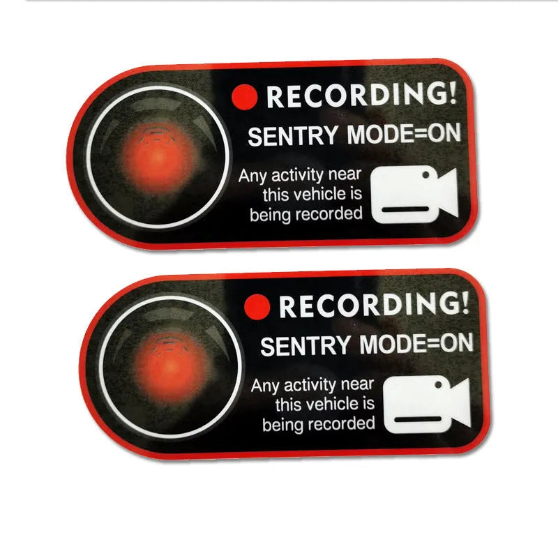 Tesla Sentry Mode warning sticker showing English text on electrostatic PVC material