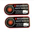 Tesla Sentry Mode warning sticker showing English text on electrostatic PVC material