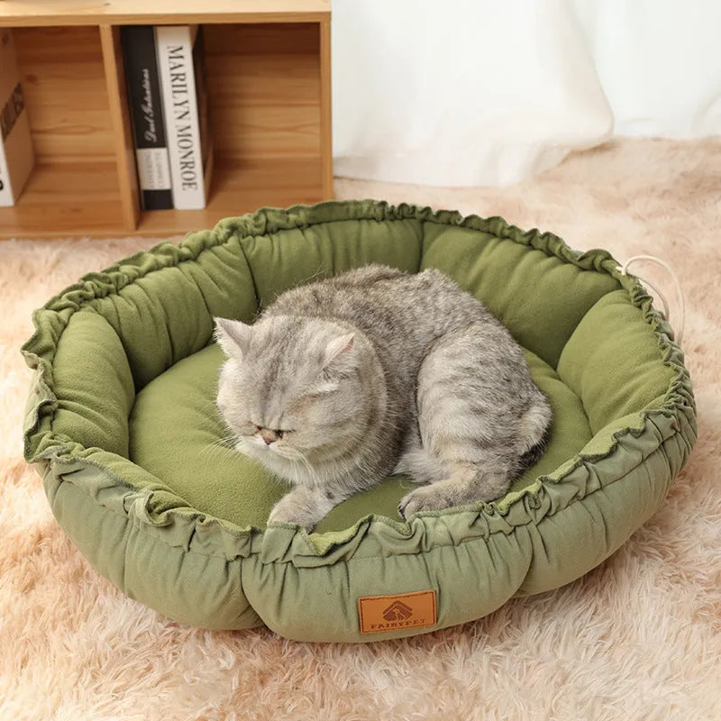 Grey and green reversible donut pet bed for cats and small dogs showing dual-sided design