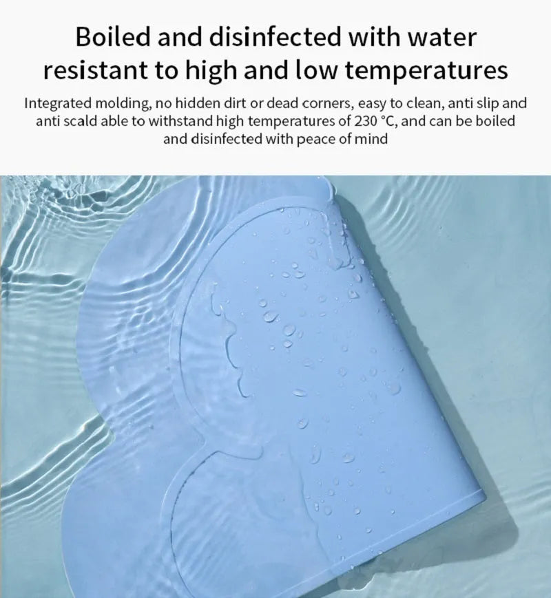 Blue silicone pet feeding mat measuring 44cm by 24cm under a dog bowl