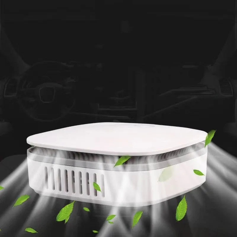 White USB-powered air purifier with button control for car and small room use.