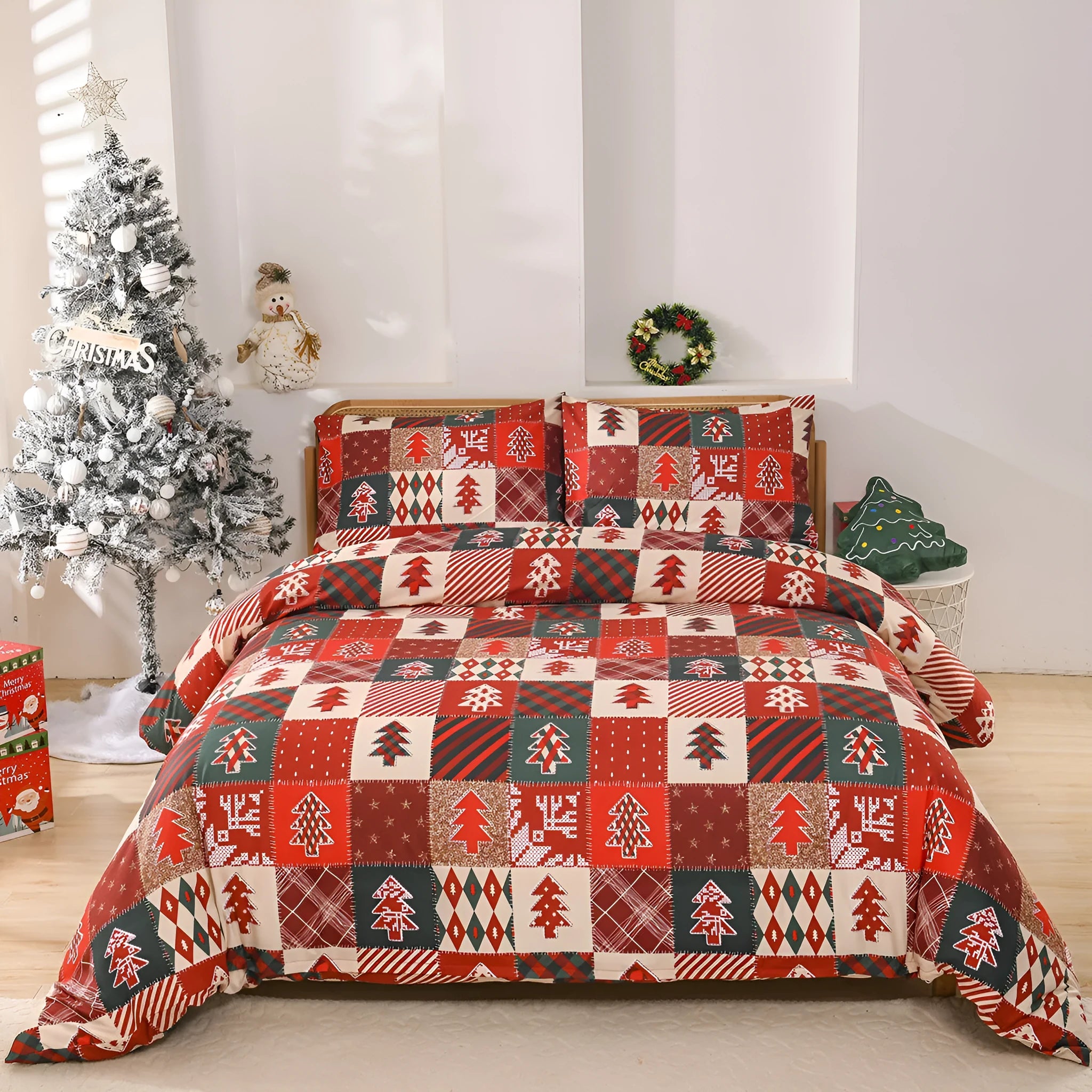 Christmas red plaid pattern bedding three-piece set with quilt cover and pillowcases on a bed.
