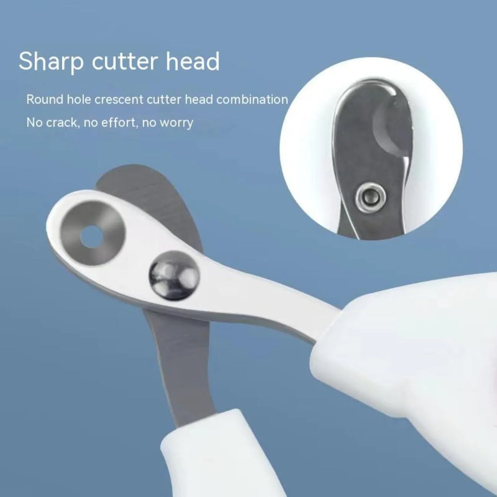 Blue pet nail clippers with circular cutting hole and cushioned handles on a white background