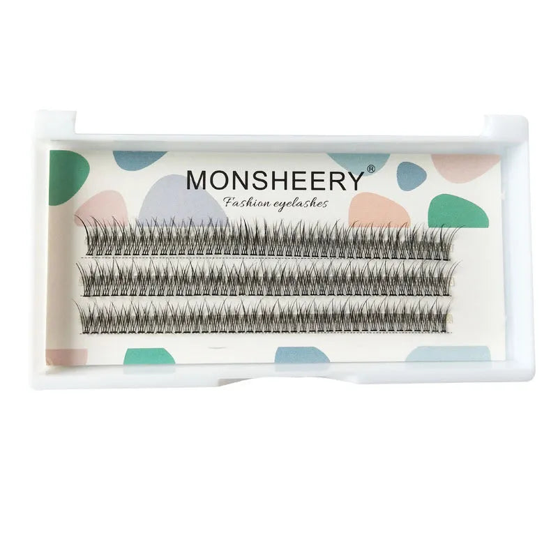 Black V-shaped fairy fishtail false eyelashes with thick segments on a clear lash band.