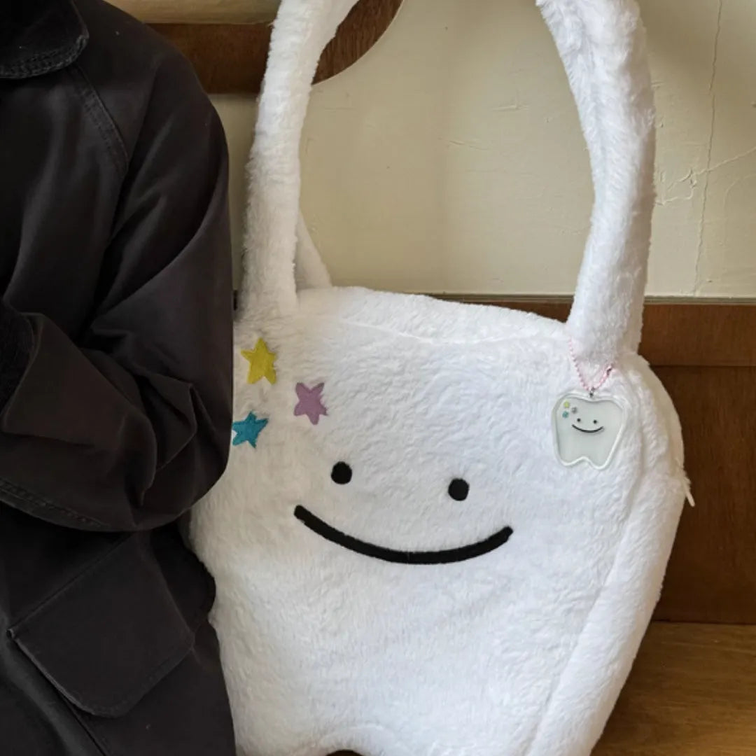 White plush shoulder tote bag with cute teeth design and crossbody strap