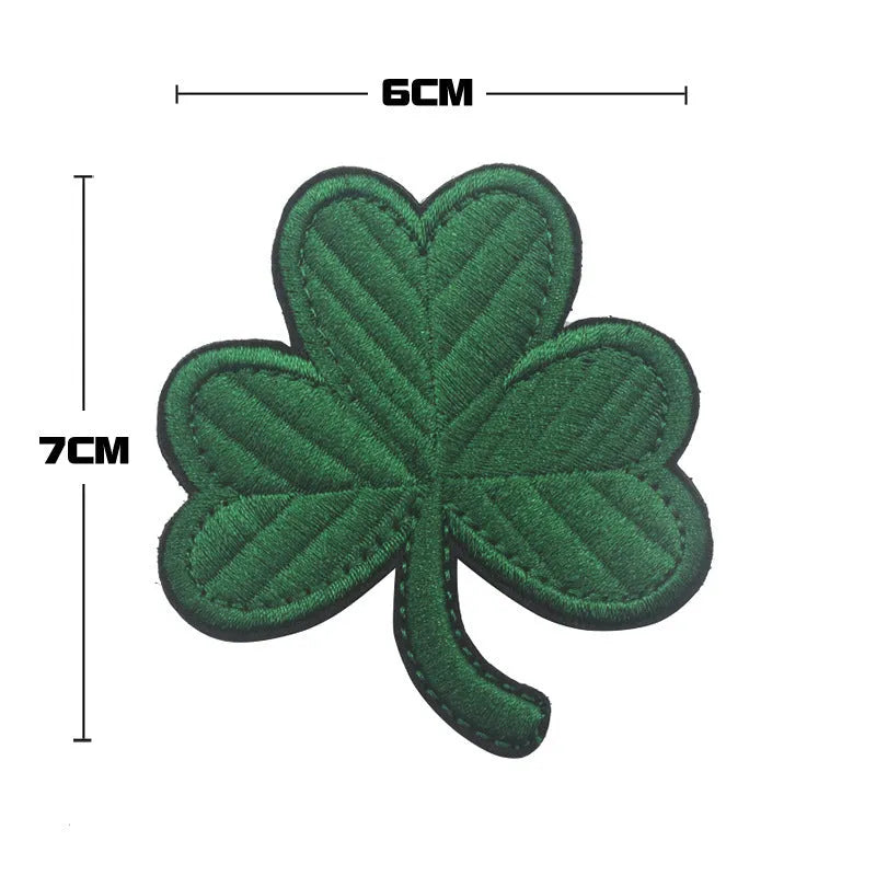 Outdoor embroidered fabric badge with Velcro backing in camo green design