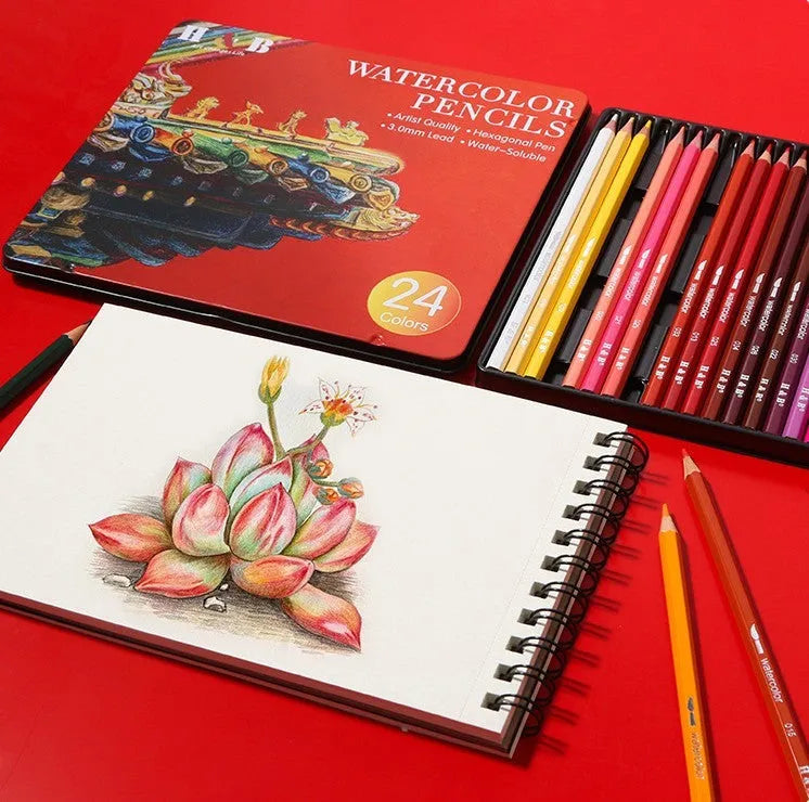 Water-soluble coloured pencil set with 24 colours, a brush, and a metal box open to show contents.