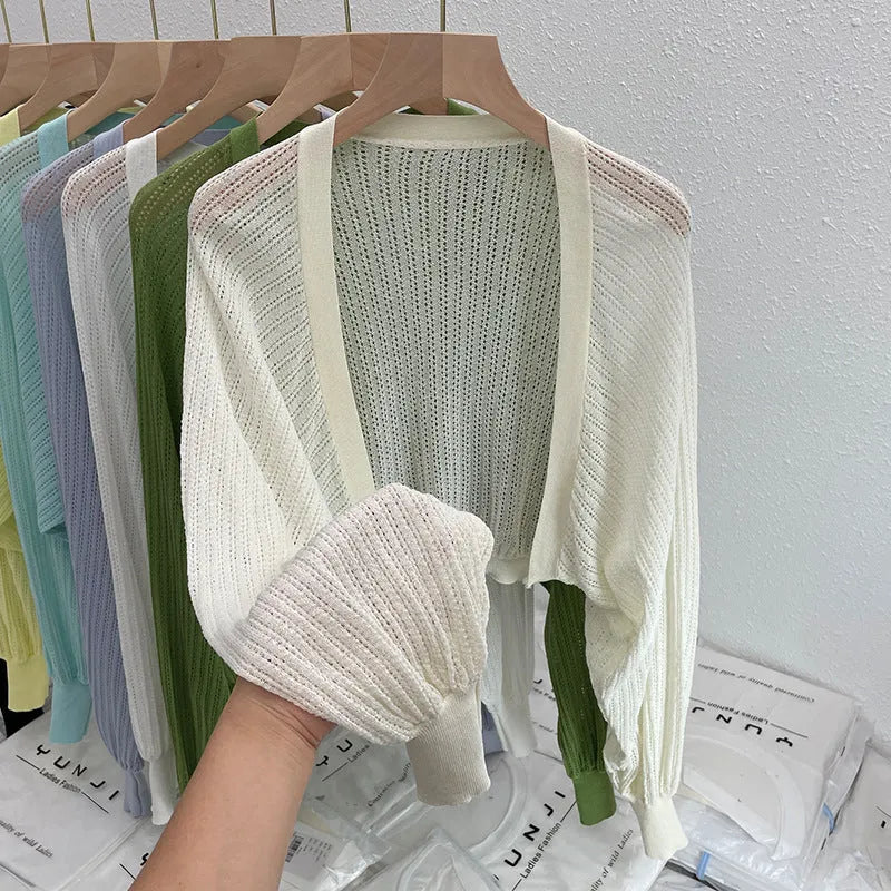 Women's linen blend blouse with hollow-out design and long lantern sleeves in apricot colour