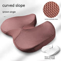 Curved bevel cushion with memory foam for tailbone support in black, grey, brown, and beige colours