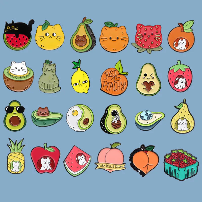 Colourful cartoon fruit design metal brooch pin with a letter shape on a white background.