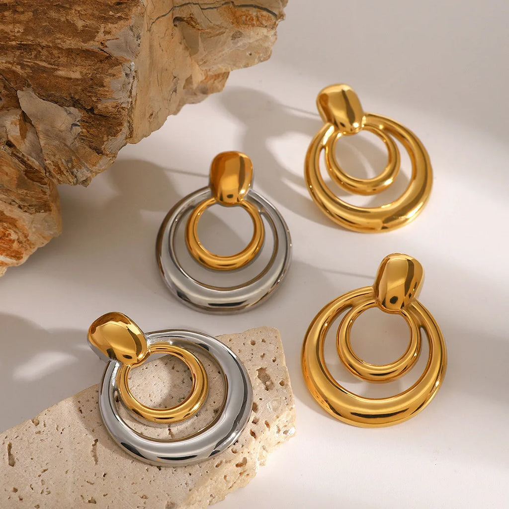Golden round double layer hollow stud earrings with geometric design on titanium steel