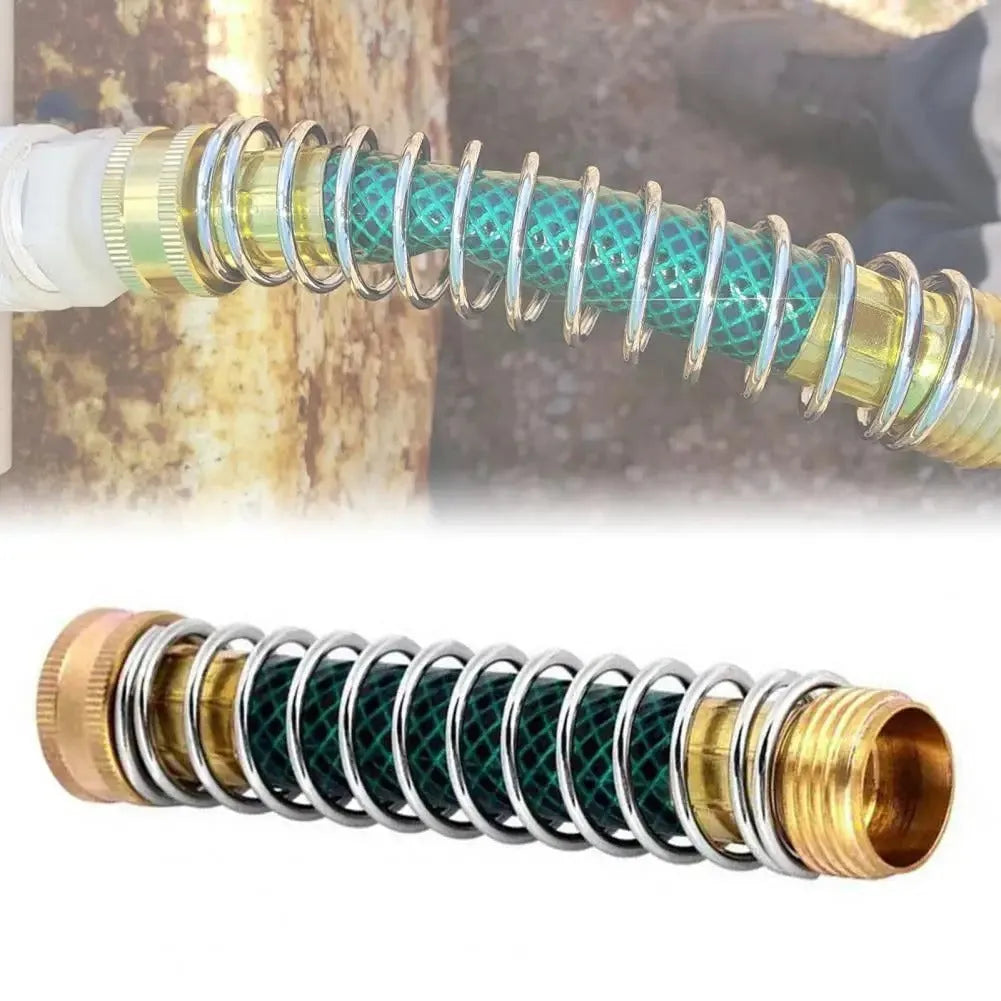 Brass garden hose spring connector with spiral visible inside, shown next to a tape measure indicating 15 cm length.