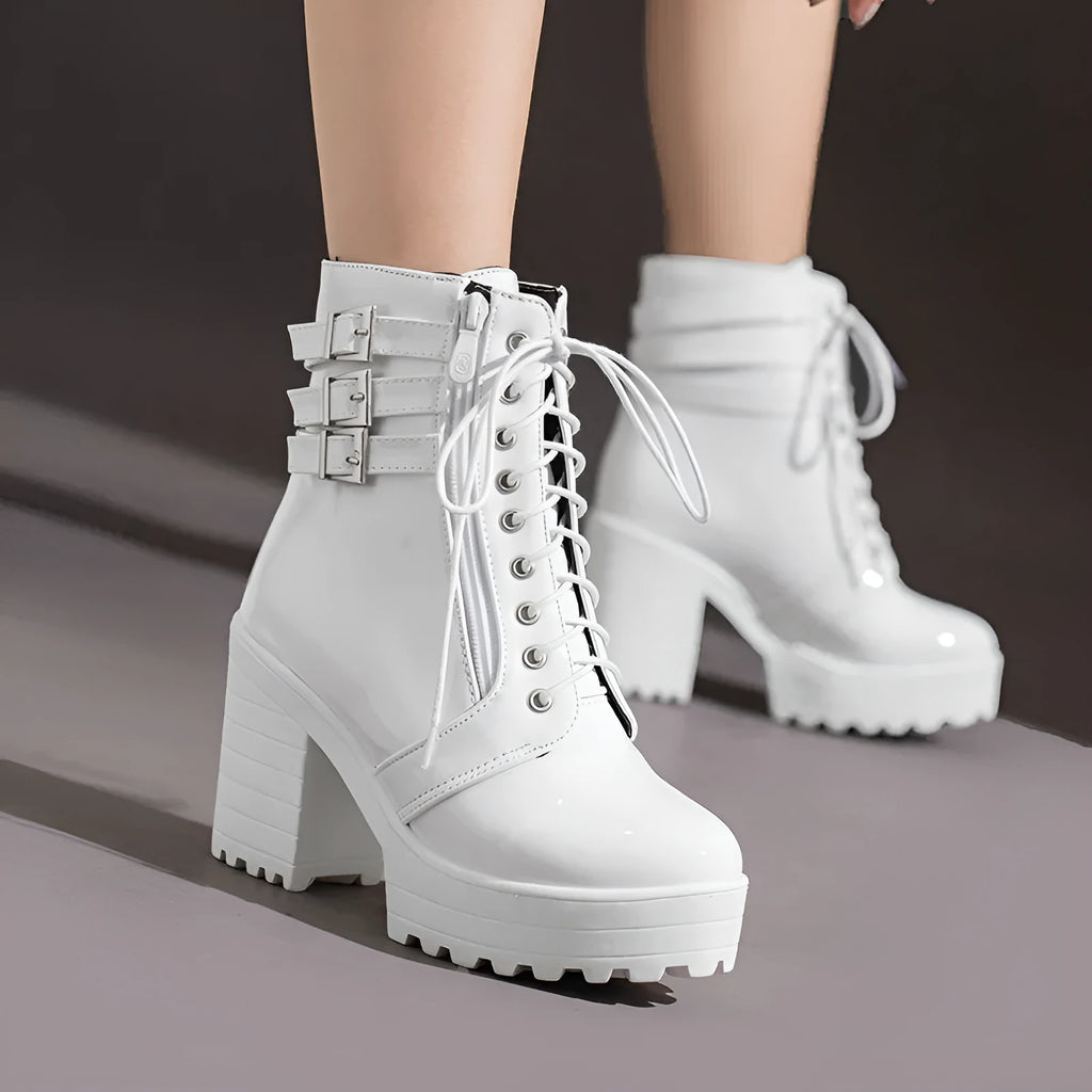 Women's black thick-heel short boots with front lace-up and round toe on a waterproof rubber sole.