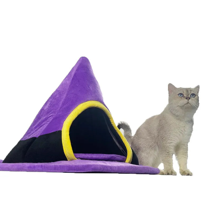 Purple Halloween witch hat shaped cat bed measuring 60 by 45 centimetres