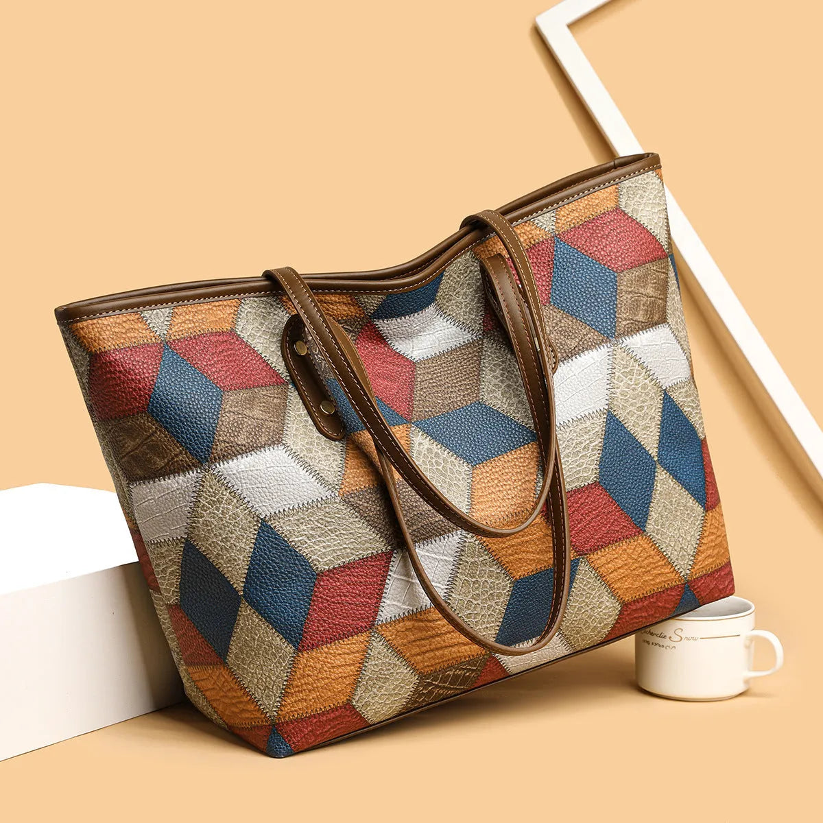 Women's PVC shoulder handbag in blue brown colour with sandwich pocket design for business commuting