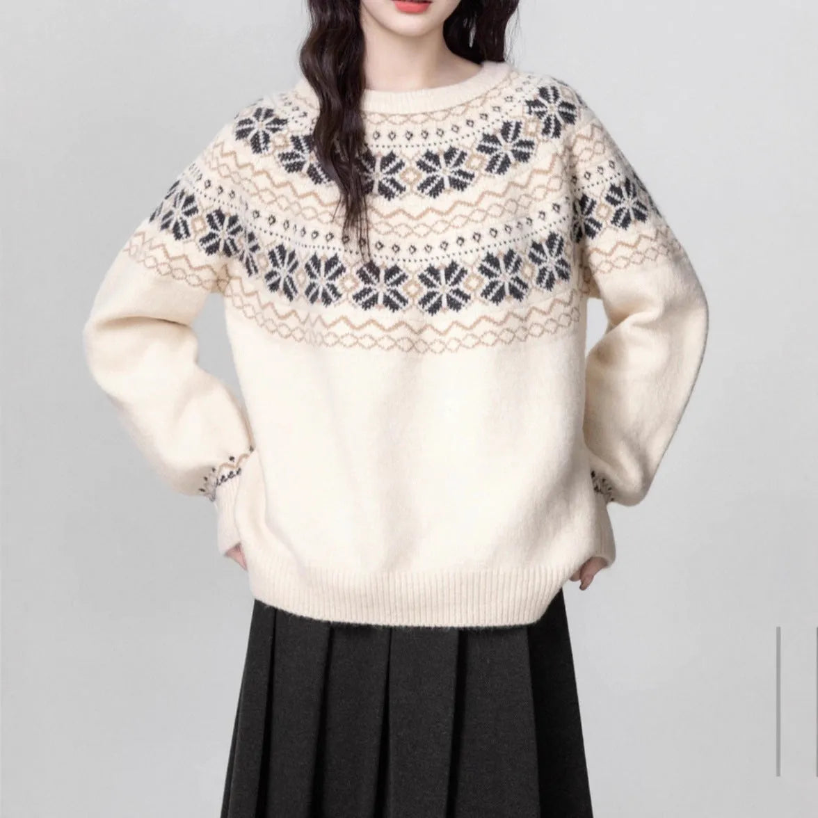 Women's milky white Fair Isle patterned knitted pullover sweater with a crew neck and long sleeves.