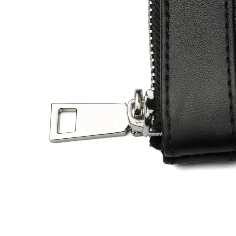 Black men's leather clutch wallet showing cowhide texture and 20x10cm dimensions