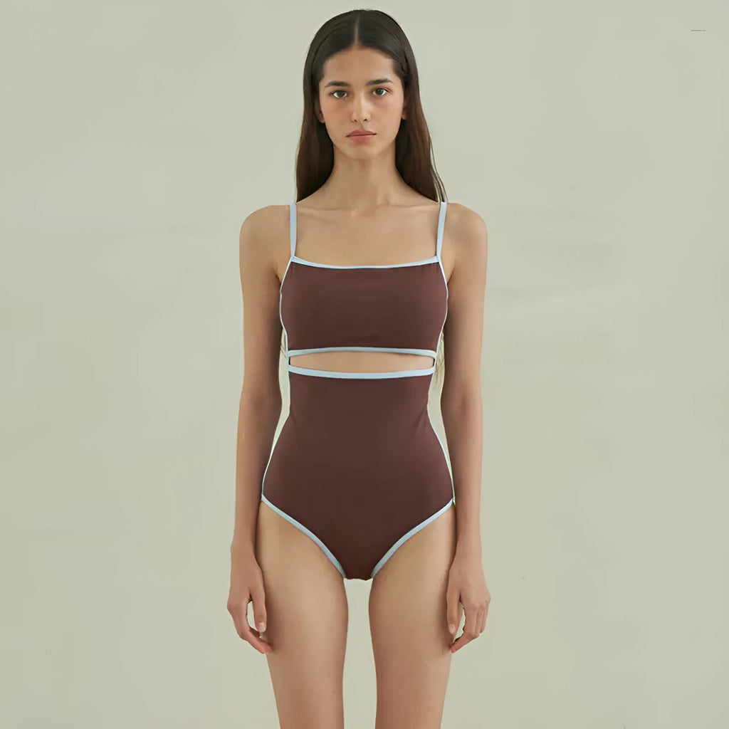 Brown triangle top one-piece swimsuit for women on a hanger.