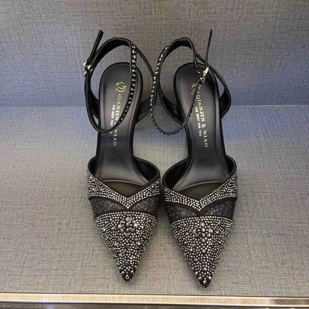Women's hollow high heels with red sole and stiletto heel in black or silver colours