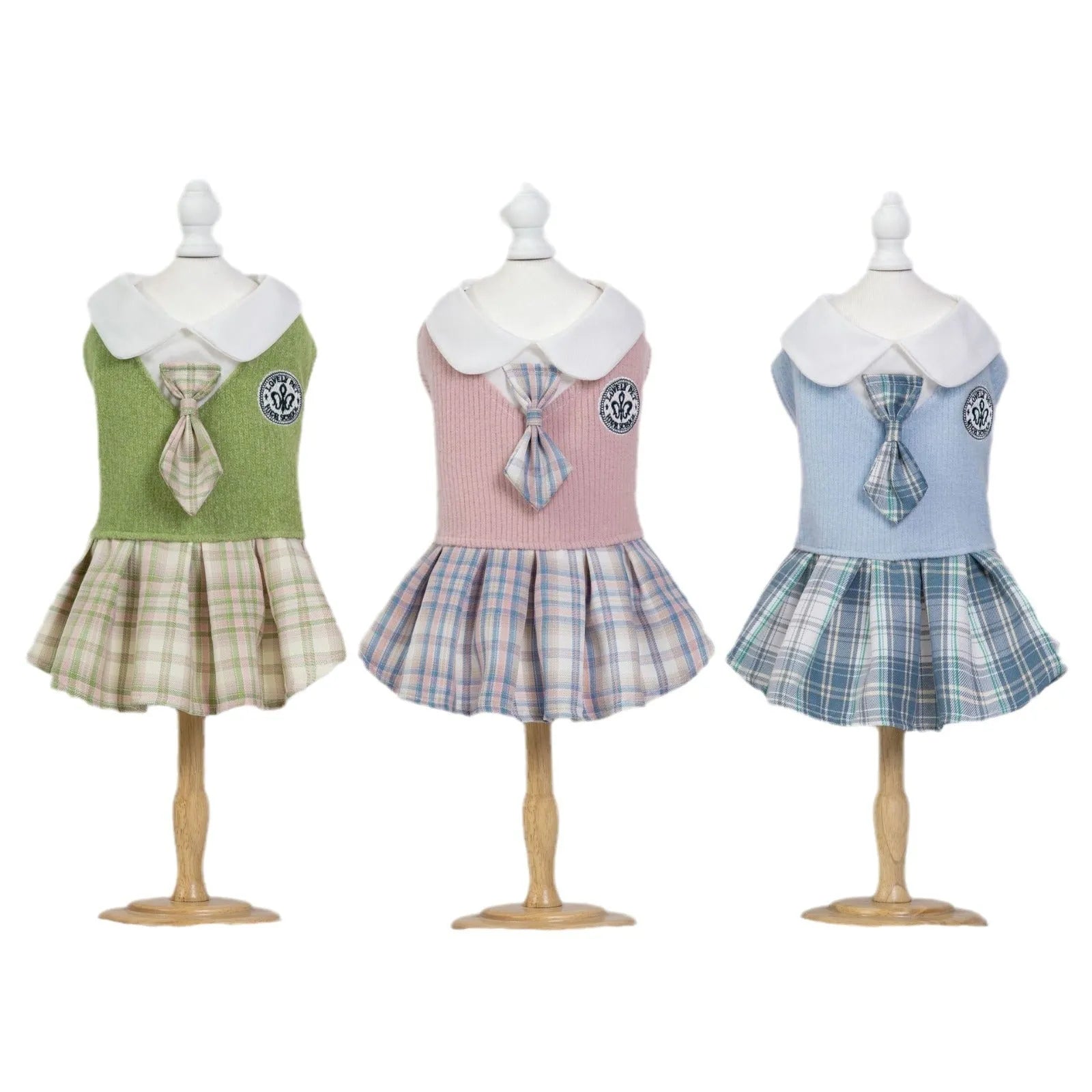 Pet dog wearing blue tartan skirt with princess style design