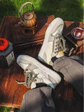 Green low top casual shoes with star pattern stitching and thick rubber soles