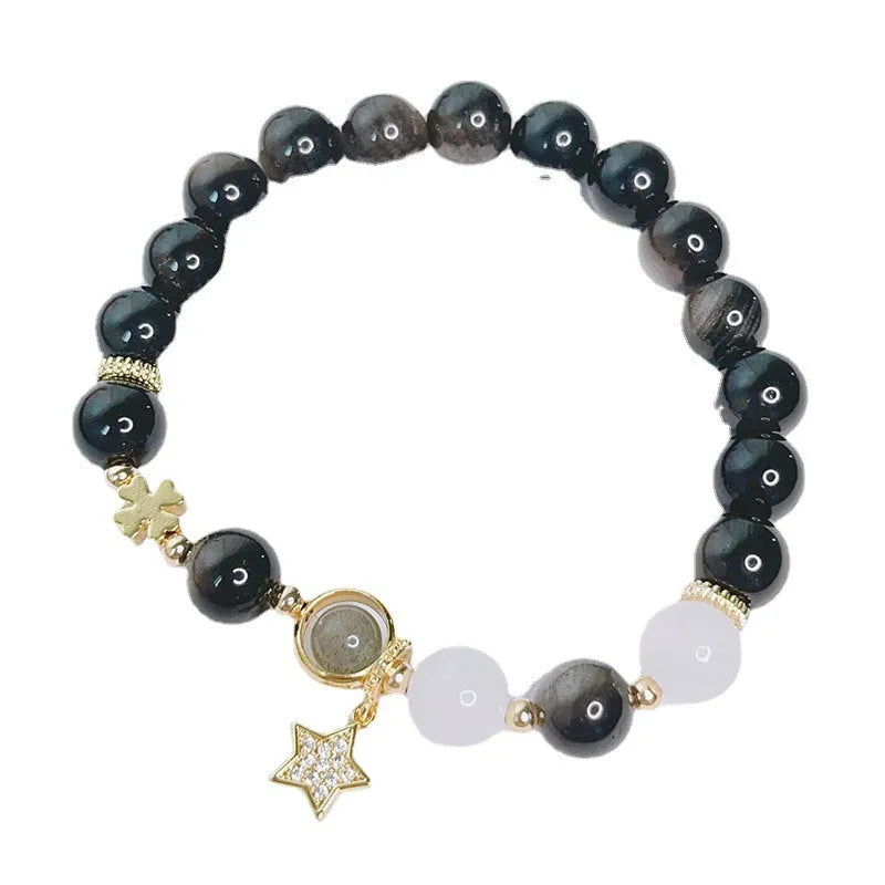 Silverstone electroplated women's bracelet with adjustable clasp and choice of floral, heart, or star charm designs