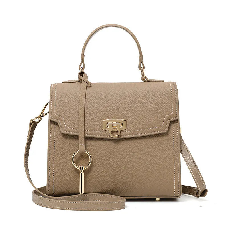 Elephant grey vintage handbag with litchi pattern lock and cowhide leather construction