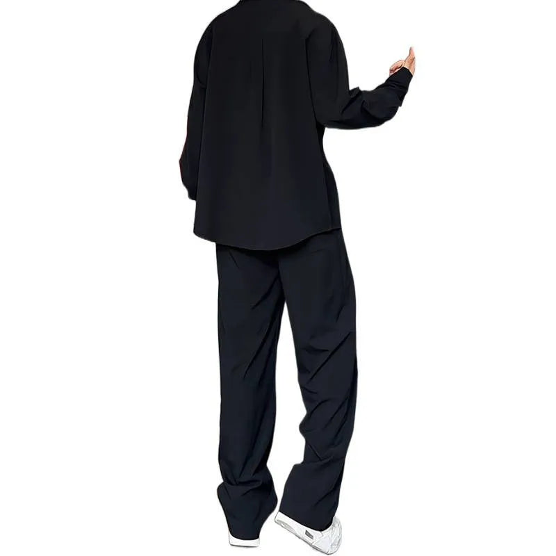 Man wearing a slim fit apricot coloured long sleeve polo shirt and matching trousers, a casual two-piece hemp suit set.