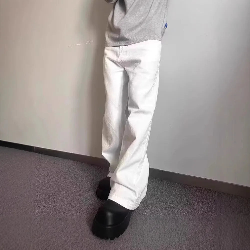 Men's white denim jeans with loose straight wide leg cut and mid waist