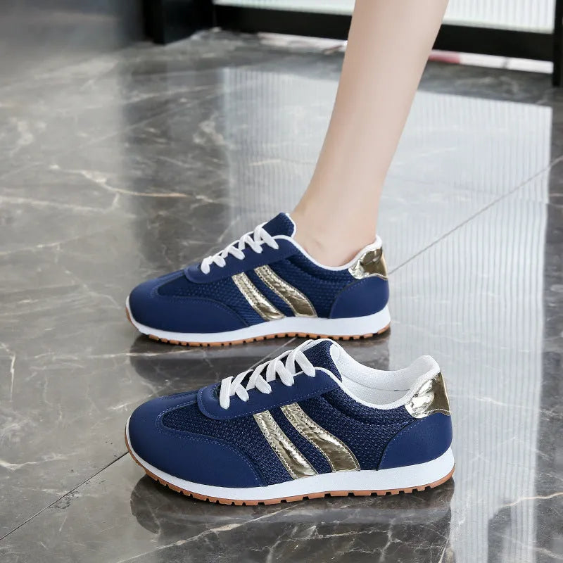 Blue women's artificial leather sports shoes with cross straps and non-slip rubber sole