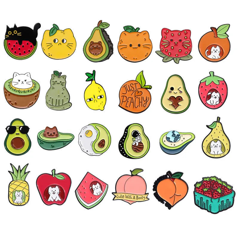 Colourful cartoon fruit design metal brooch pin with a letter shape on a white background.