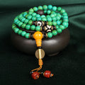 Natural turquoise bracelet with 108 polished 8mm round beads showing raw ore texture
