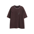 Men's loose fit black embroidered retro short-sleeved cotton t-shirt on a hanger