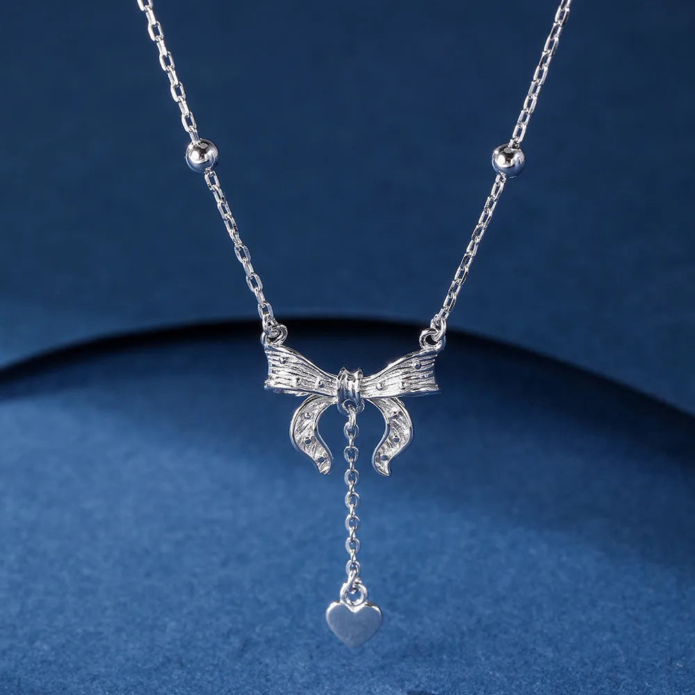 S925 silver butterfly heart pendant on an adjustable O-ring clavicle chain.