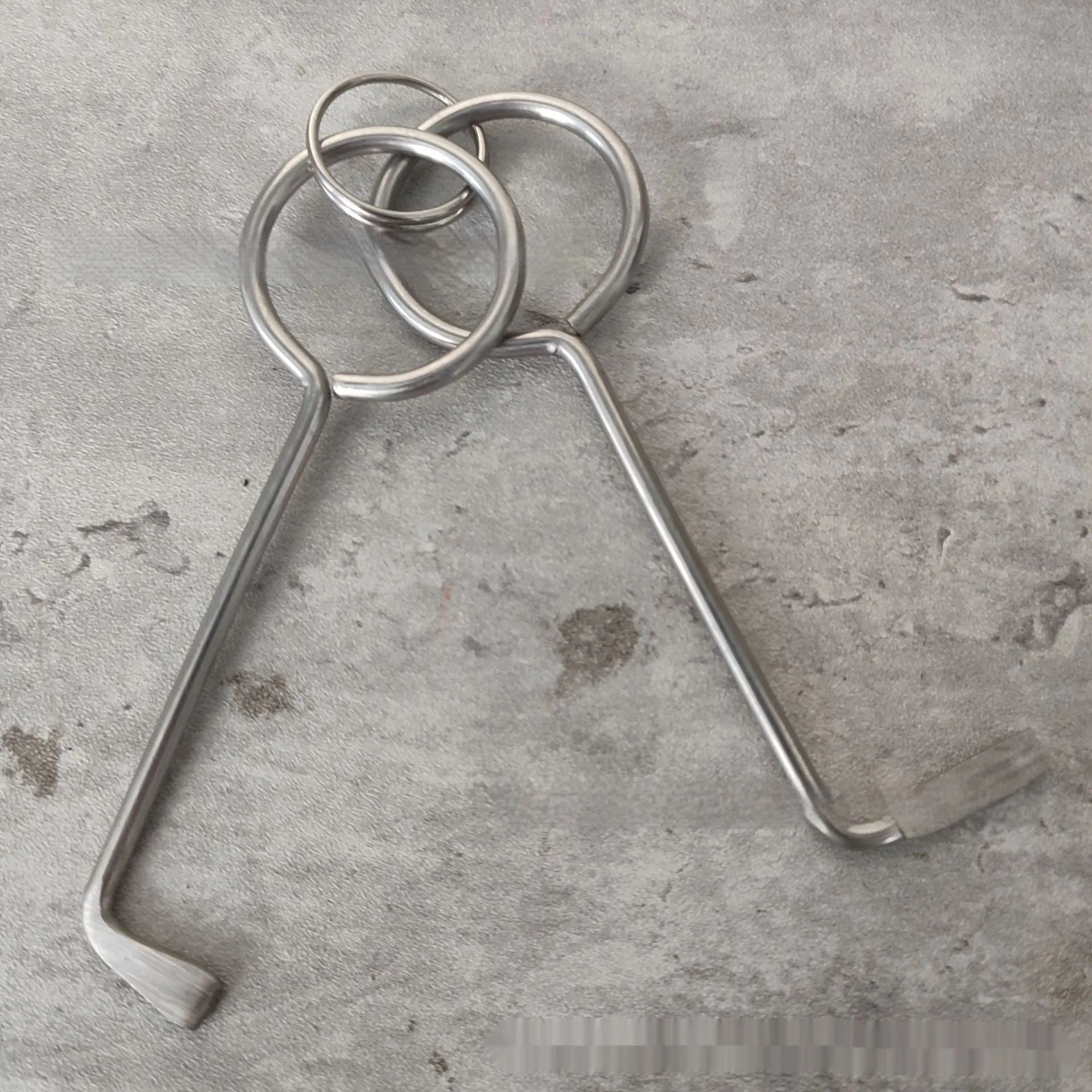 Two alloy wrench tools from portable universal maintenance set