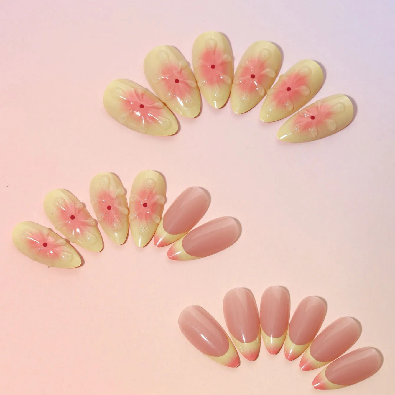 Set of plastic press-on nails with raised 3D cartoon flower design, jelly glue tube, and nail file.