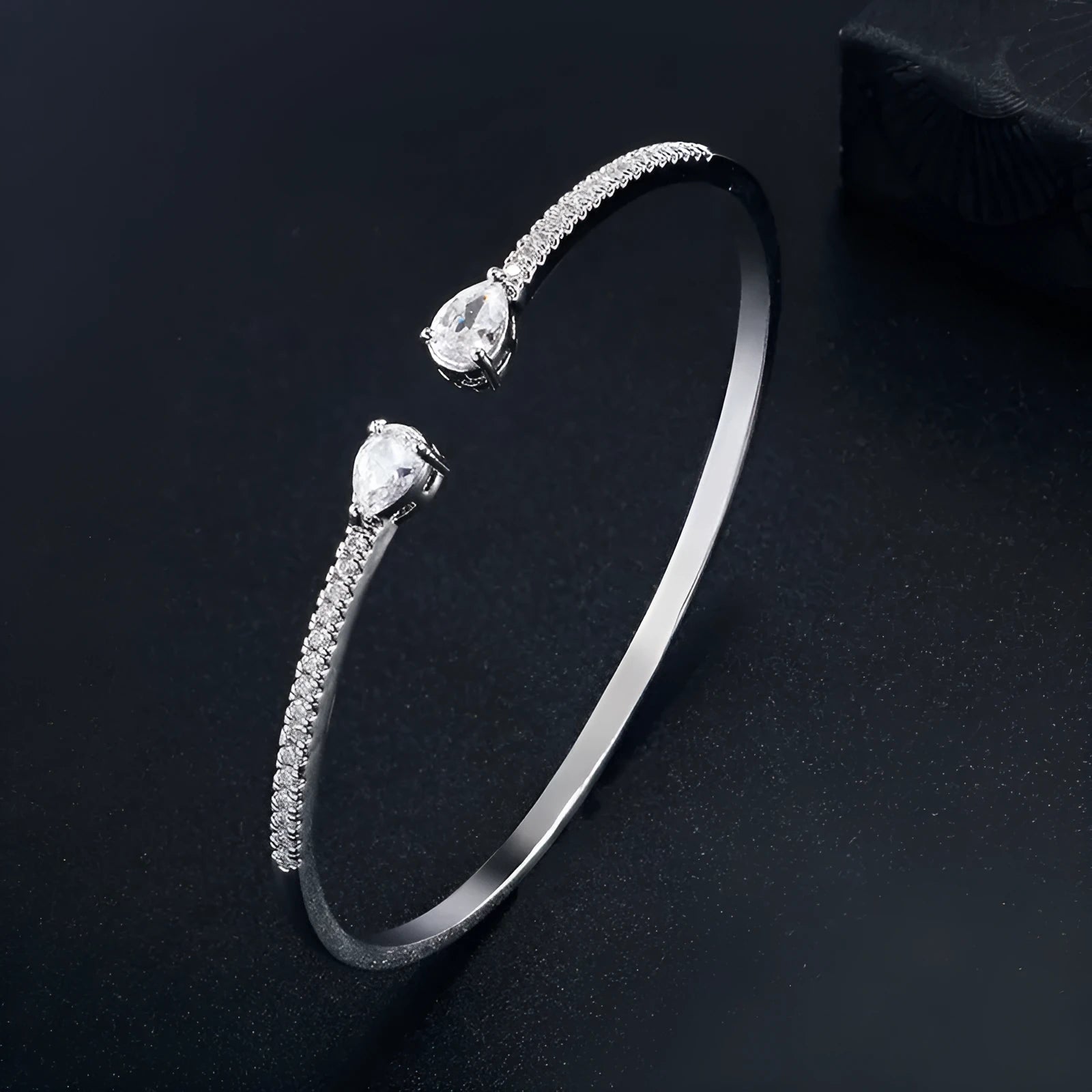 Copper bracelet with inlaid white zircon stones in simple jewellery design