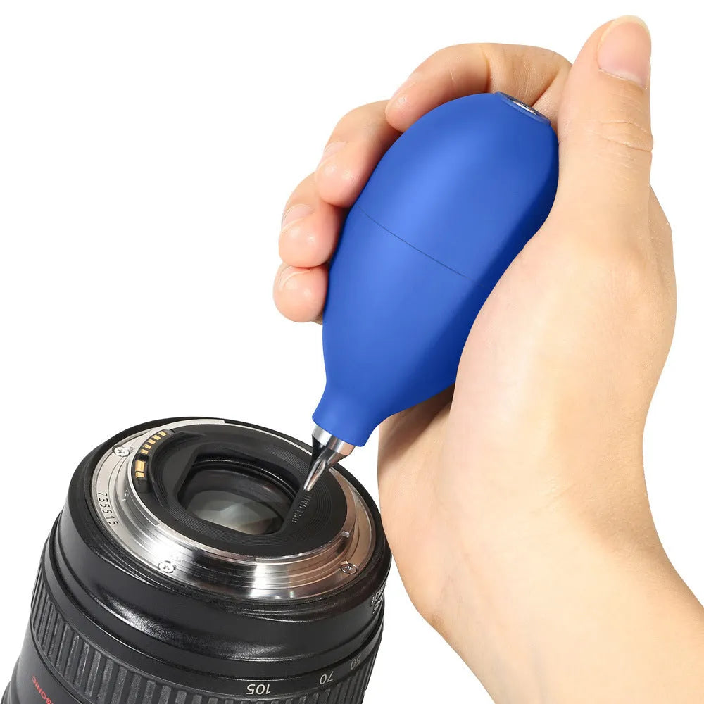 Blue rubber manual dust removal blower for cleaning cameras and mobile phones.