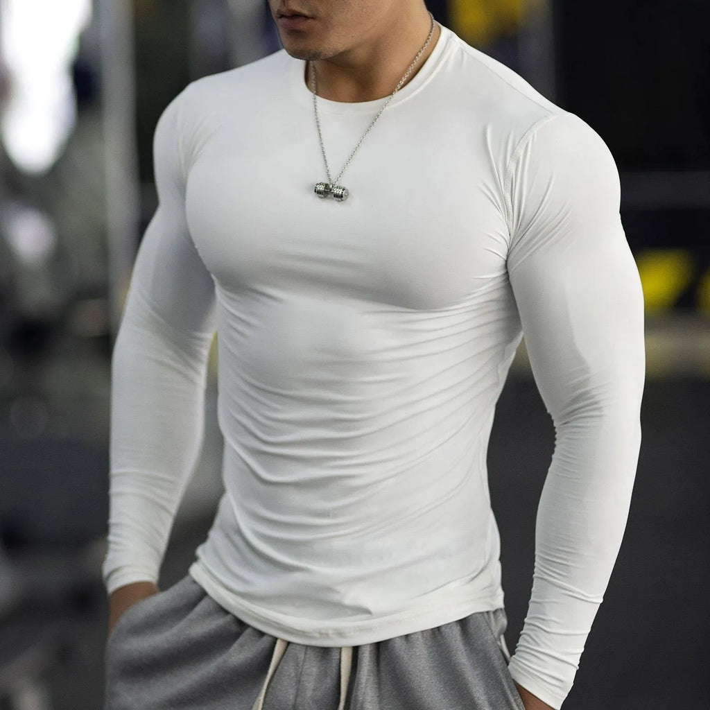 Men's black fitness tights with long sleeves slim fit for running and gym workouts