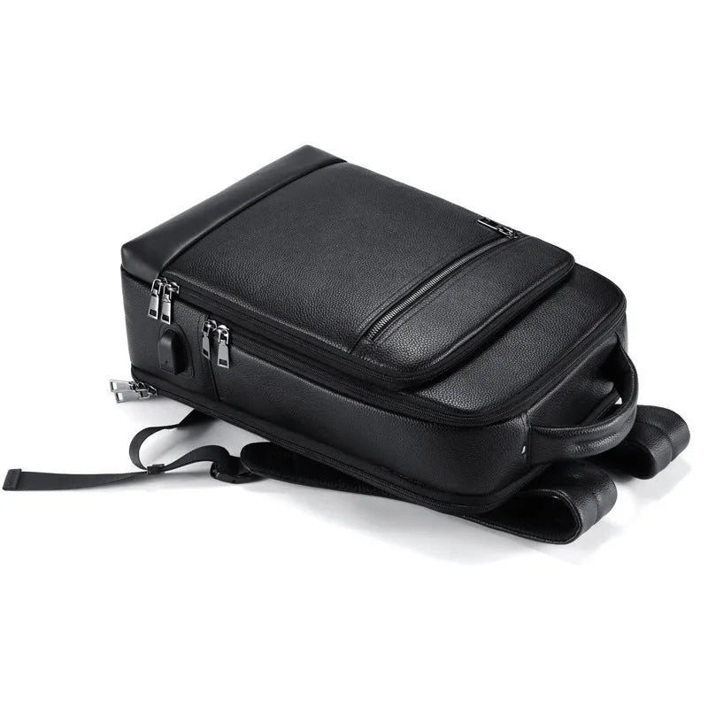 Black genuine leather men's business laptop backpack with curved shoulder straps and visible sewing details